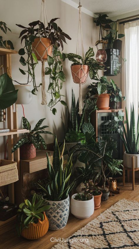 Bring nature indoors with these 14 boho living room plant ideas! From lush hanging plants to potted succulents, these green accents will add a fresh, cozy jungle vibe to your bohemian living space. Jungle Apartment Decor, Jungle Living Room Ideas, Living Room Plant Ideas, Plant Filled Living Room, Creative Ways To Display Plants, Room Decor With Plants, Bohemian Plants, Indoor Plant Aesthetic, Indoor Plant Room