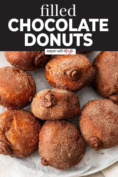 These soft, fluffy chocolate filled donuts are classic fried donuts with a cocoa sugar coating and rich, chocolate ganache filling. Chocolate Donuts Fried, Donuts Filled, Doughnut Recipes, Donut Filling, Pastries Recipes, Whipped Ganache, Ganache Filling, Chocolate Ganache Filling, Fried Donuts