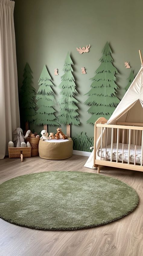 Cozy gender-neutral nursery with tree wall art, olive teepee, white crib, gray grass carpet, and stuffed animals in a wooden Green Nursery Paint Colors, Dark Gray Carpet, Church Nursery Decor, Nautical Theme Nursery, Nature Themed Nursery, Nursery Green, Gender Neutral Nursery Design, Dark Grey Carpet, Nursery Design Neutral