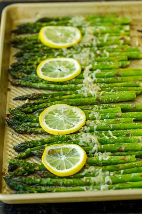 The perfect side dish - Roasted Asparagus with lemon, butter, and parmesan. An easy, baked asparagus recipe that pairs well with everything. Asparagus Side, Natasha Kitchen, Sauteed Asparagus, Easy Asparagus Recipes, Natashas Kitchen, Asparagus Casserole, Asparagus Recipes Baked, Asparagus Recipes Roasted, Parmesan Asparagus