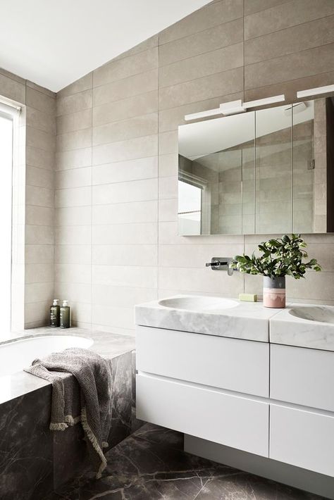 The Japanese design flows through to the bathroom. Photo: Eve Wilson | Styling: Ruth Welsby |  Story: Australian House & Garden Inset Tub, Inset Bathtub, Bathtub Design Ideas, Inset Bath, Cafe Industrial, Japanese Industrial, Bath Surround, Bathtub Surround, Small Bathtub