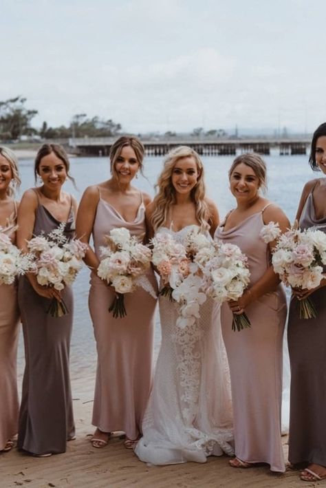 Elegant bridesmaids in mismatched satin dresses in soft blush and coral for luxury outdoor wedding | Bridesmaids | Bridesmaids dresses | Mismatched bridesmaids | Odd number bridesmaids | Blush bridesmaids | Pink bridesmaids | Coral bridesmaids | Satin bridesmaid dressed | Cowl neck bridesmaids | Spaghetti strap bridesmaid dresses | Bridesmaid hair style | Bridesmaid flowers | Bride tribe | Bridal squad Bridesmaid Dresses Abroad Wedding, Two Colour Bridesmaid Dresses, Neutral Bridesmaids Dresses Mismatched, Mismatched Bridesmaid Dresses Color Schemes, Multi Tone Bridesmaid Dresses, Miss Matching Bridesmaid Dresses, Alternating Bridesmaid Dress Colors, Neutral Bridesmaid Dresses Mismatched Color Schemes, Mismatched Color Bridesmaid Dresses