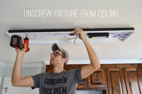 How To Replace Fluorescent Lighting With A Pendant Fixture | Young House Love Fluorescent Kitchen Lights, Countertop Concrete, Flourescent Light, Diy Kitchen Lighting, Lighting Makeover, Fluorescent Light Fixture, Laundry Room Lighting, Fluorescent Lighting, Young House