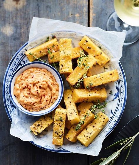 Crispy polenta bites known as Milho Frito in Portugal. For a healthier take, we cooked them in the #Airfryer instead of deep-frying them. Pimentón aioli on the side for dunking. Portuguese Party, Polenta Bites, Frito Recipe, Crispy Polenta, Deep Frying, Party Menu, Portuguese Recipes, Party Foods, Aioli