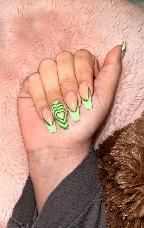 Green French Tip Acrylic Nails for March or St Patrick’s Day Green Nails With Heart Design, Green Heart Acrylic Nails, Nails With Green Hearts, Power Puff Heart Nails, Green Nails Heart Design, Power Puff Nails, Green Valentines Nails, Powerpuff Nails Acrylic, St Patricks Day Nails Acrylic