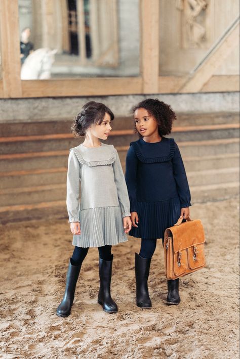 The National Equestrian Academy of the Domaine de Versailles opens its doors to Tartine et Chocolat. The magic happens with the sound of hooves on the paving stones and the smell of leather in the saddlery. This prestigious place full of history invites the children to dream. #tartineetchocolat #fashion #kidsfashion #ecuriedeverailles #versailles #automn #winter School Collection, Paving Stones, Kids' Fashion, Versailles, The Sound, The National, Equestrian, The Magic, Back To School