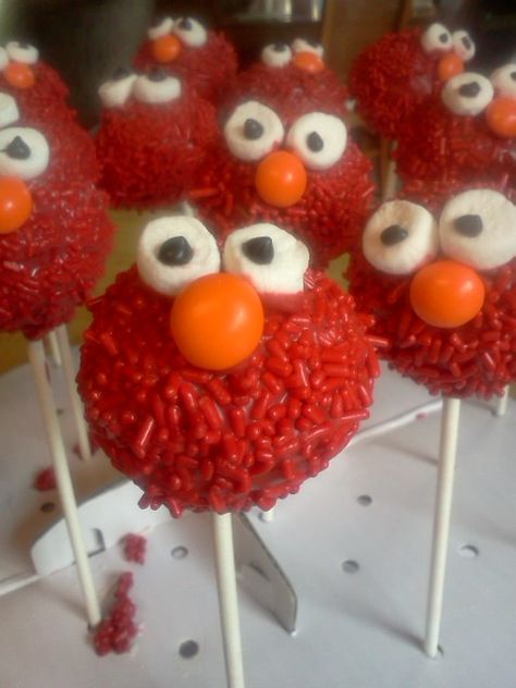 going to make these for my coworkers kids 1st birthday party in Jan Elmo Party Treats, Elmo Cake Pops, Elmo First Birthday Party Boy, Cakepops Ideas, Elmo Birthday Party Boy, Elmo Birthday Cake, Celebrities Tattoos, Elmo Cake, Elmo Birthday Party