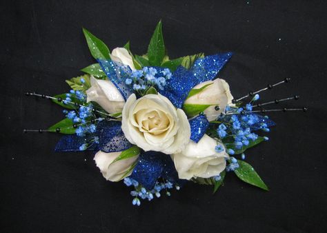 Wrist Corsages for Homecoming | White and Blue Wrist Corsage Blue Wrist Corsage, Prom Flowers Corsage, Blue Corsage, White Corsage, Homecoming Flowers, Prom Corsage And Boutonniere, Wrist Corsage Prom, Homecoming Corsage, White Spray Roses