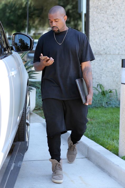 The Kanye West Look Book Photos | GQ Yeezy 750 Outfit, Kanye West Outfits, Kanye Fashion, Kanye West Style, Yeezy 750, Yeezy Outfit, Mens Fashion Streetwear, Adidas Yeezy Boost 350, Designer Clothes For Men