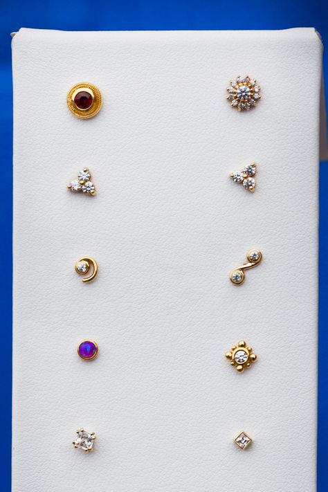 dermals http://bornthiswaybodyarts.com/gold-jewelry/ Dermal Jewelry, Small Earrings Gold, Nose Ring Jewelry, Nose Piercing Jewelry, Nose Pin, Gold Chain Jewelry, Nose Jewelry, Born This Way, Jewelry Design Earrings