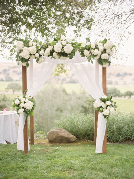 Wedding Arch With White Roses, Green And White Alter Flowers, Hydrangea Wedding Arbor, Stone Tower Winery Wedding, White And Green Wedding Arch, Altar Florals, Arbour Flowers, Wedding White Flowers, White Arbor