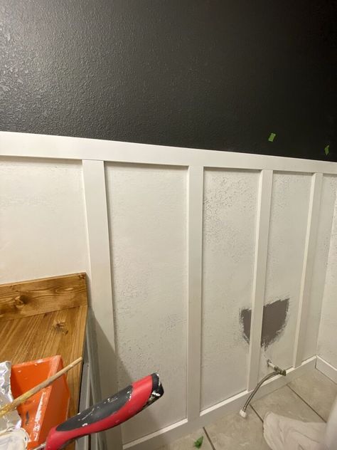 This project is an easy way to install your own "board" and batten. There are no boards, only battens made from inexpensive MDF! Let's get into the steps you need to install your own!   You'll need joint compound and a knockdown knife and, if needed, drywall repair kits. I had two holes to cover. The paint I used for the top part of the walls was Sherwin Williams "Carbonized". Determine how far up the battens are going to go and mark. If you have textured walls, use joint compound to s… Textured Board And Batten, Textured Walls Board And Batten, Batton Board On Textured Walls, Board And Batten Wall With Textured Walls, Covering Up Textured Walls, Board And Batten On Plaster Walls, How To Update Textured Walls, Cover Up Textured Walls, Textured Walls In Bathroom