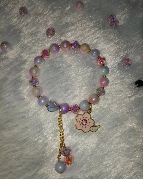 Prettiest beaded strech bracelet pink and purple theme done by customer's wish🤗 AlhamdhulILLAH she loved it more🫶🏼 <Dispatched pic Place order on @fashlivinghijababaya #bracelet #handmadebracelets #handmade #beadbracelets #beadbracelet #bracelets #braceletlover #love #panda #butterfly #charm #charms #butterflycharm #charm #beadedjewelry #beadedjewelryofinstagram #charmnecklace #daisycharm #daisyflower Panda Butterfly, Love Panda, Purple Theme, Daisy Charm, Purple Themes, Butterfly Charm, Pink Bracelet, Pink And Purple, Daisy Flower