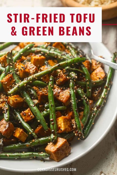 This scrumptious stir-fry is made with crispy tofu and stir-fried green beans in a savory sesame garlic sauce. It's satisfying, flavorful, and a total cinch to make! Tofu Green Beans Recipe, Sesame Garlic Sauce, Tofu Green Beans, Bean Tofu, Stir Fry Beans, Green Beans Mushrooms, Healthy Vegan Dinner Recipes, Vegan Entrees, Healthy Vegan Dinner