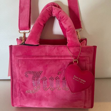 Nwt Viral Juicy Couture Big Spender Mini Tote / Crossbody Bag - Free Love Velour With Gold Tone Hardware Colorful Studded Front Logo 9.5" Wide X 7" Tall X 4.5" (D) Puffy Heart Charm On The Front With Flat Faux Leather Base Detachable / Adjustable Pink Velour Strap Magnetic Snap Flap Closure On Top Interior Is Lined With Juicy Couture Logo Has A Zippered Pocket And Two Slip Pockets Inside Light Weight / Spacious Fashionable Bag Guaranteed To Be Brand New And 100% Authentic Juicy Couture Purse, Free Love, Pink Tote Bags, Couture Bags, Juicy Couture Bags, Heart Bag, Crossbody Tote Bag, Pink Tote, Mini Tote Bag