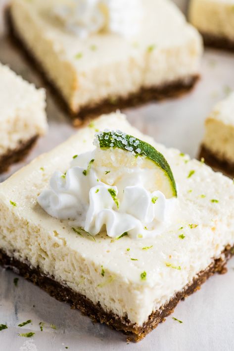 These Margarita Cheesecake Bars are creamy, made with a touch of tequila and sit on a buttery graham cracker crust. Margarita Bars, Margarita Cheesecake, Isabel Eats, Margarita Bar, Tequila Margarita, Boozy Desserts, Cracker Crust, Cake Bars, Cheesecake Bars