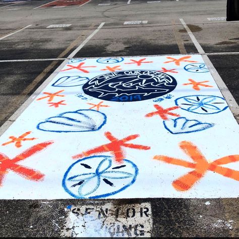 Painted parking spot save our ocean Ocean Senior Parking Spot, Beach Parking Spot Painting, Ocean Parking Spot Painting, Beachy Senior Parking Spot, Unique Senior Parking Spot Ideas, Highschool Parking Spot Ideas, Painted Parking Spaces Ideas, Parking Lot Painting, Parking Spot Painting