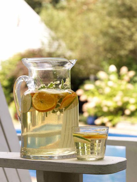 Serve a refreshing white wine sangria with your summer Greek feast. Apricot nectar sets this punch apart from traditional sangria. White Sangria Recipe, Apricot Nectar, Holiday Punch Recipe, Fruity Alcohol Drinks, White Wine Sangria, Greek Dinners, Sangria Wine, Holiday Punch, White Sangria