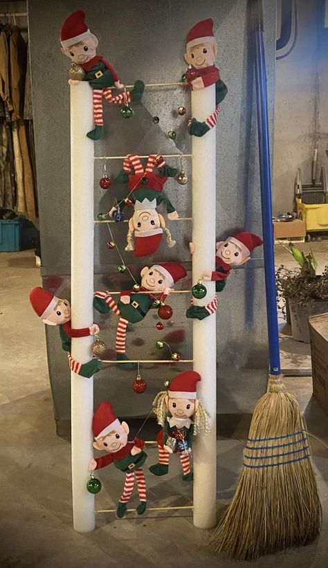 Dollar Tree Fanatics Crafts & Decor | My elf ladder made with DT elf’s Christmas Elf Decor Ideas, Christmas Decor Ladder, Diy Elf Christmas Decorations, Elf Diy Decorations, Elf Ladder For Christmas Tree Diy, Diy Christmas Ladder, Dollar Tree Elf, Christmas Ladders Ideas, Dollar Tree Elves