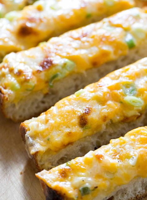 Cheesy Bread! EASY 20 MIN It's like instant pizza, or a cross between pizza and garlic bread. A real crowd pleaser, perfect for a large gathering. #GameDay #SuperBowl On SimplyRecipes.com Cheesy Bread Recipe, Bread Sticks, Bread Easy, Cheesy Bread, Simply Recipes, Delicious Snacks Recipes, Cheese Bread, Party Foods, Crowd Pleaser