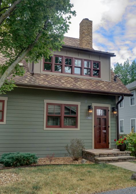 Green And Burgundy House Exterior, Exterior Paint Craftsman, Historic Craftsman Exterior, Green And Maroon House Exterior, Home Color Ideas Outdoor, Orange Trim House Exterior, Green Houses With Cream Trim, Green And Red Brick House Exterior, Brown Bungalow Exterior