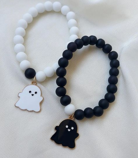 Cute baby ghost charm bracelet 👻 Link in bio 🔗 #beadsbracelet et #jewellery #chenaai #matchingbracelets #neckchain #friendship #bracelet #koreanaccessories #hyderabad #fashionjewellery #evileye #blackbeads #blackandwhite #koreanjewelry #earrings #diamondring #instagood #chunkyjewelry #fashion #trending #supportsmallbusiness # #accessories #explore #necklace #reels #kolkata #bhfyp Rose Quartz Bracelet Beads, Korean Accessories, Korean Jewelry, Rose Quartz Bracelet, Bracelets Diy, Charms Bracelet, Chunky Jewelry, Neck Chain, Beaded Bracelets Diy