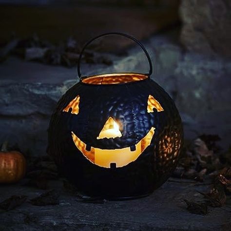 Black Halloween Decoration Pumpkin Outdoor/Indoor lamp. The N.I.OVERSEAS's real eye-catcher lamp for your outdoor decoration with this scary metal pumpkin, we save ourselves the carving this year and leave no mess. Metal Pumpkins, Indoor Lamp, Pumpkin Halloween Decorations, Black Halloween, Halloween Decorations, Indoor Outdoor, Carving, Halloween, Outdoor Decor