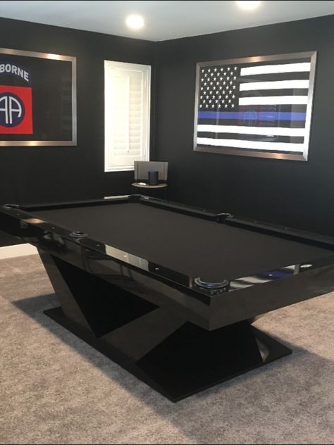 Dark, rich, & smooth! Our Luxor Pool Table.
This Luxor Pool Table features one of our most popular finishes, Piano Black High gloss. You can never go wrong with an all black table, its a very elegant look. Everything is handcrafted in our warehouse in Los Angles. Lets get started on your dream table today. #pool #pooltable  #luxury #modern #luxurious #modernhomes #handcrated #wealthy #gameroom #billiards #billiardsroom #luxuryfurniture #interiordesign #interiordesigner #interiorstyling #mancave Billiards Table Design, Cool Pool Table, All Black Table, Modern Pool Table Room, Billiard Room Ideas Interior Design, Pool Table Room Ideas, Custom Pool Table, Pool Room Decor, Dining Room Pool Table