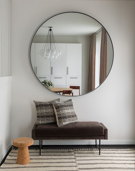 Oversized round mirror in the entryway over a bench with pillows and a striped rug Round Floor Mirror, Round Mirror Entryway, Bench For Entryway, Decorative Bench, Tiny Dining Rooms, Small Mudroom, Mirror Entryway, Foyer Furniture, Console Table Styling