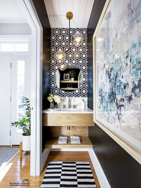 A tiny powder room gets a glam makeover! SW-Tricorn Black Luxe Powder Room Ideas, Bold Powder Room Ideas Modern, Statement Powder Room Modern, Powder Room Backsplash Ideas, Large Powder Room Ideas, Luxury Powder Room Design Modern, Powder Room Floor Ideas, Tiny Powder Room Ideas Modern, Small Powder Room Ideas Modern