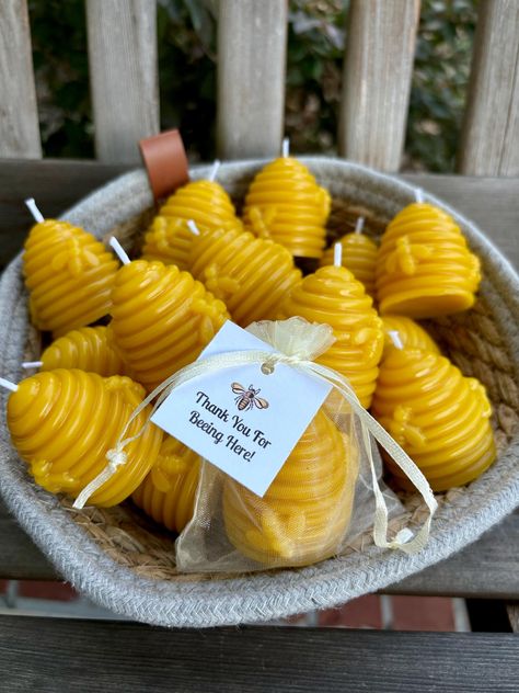 Perfect personalized party favors for your next bumble bee, honey bee or Oh, Honey-themed event. Lovely beehive candles are made of all natural beeswax. Candles are approx 1.5in by 2in tall. Beehive candles are unscented, but do have a warm, from the hive honey scent.  Each candle is packaged in an ivory organza bag with square, cardstock tag attached.  These favors are ready for your next baby/bridal shower, birthday party, office event and so much more! All items ship quickly.  We love our family owned Apiary and the bees constantly amaze us! Honey Themed Party Favors, Honey Bee Tea Party, Bees Birthday Party Ideas, Honey Birthday Party, Honey Themed Baby Shower Ideas, Sweet As Can Bee Baby Shower Ideas, Honey Bee Baby Shower Ideas, Bee Centerpiece Ideas, Bee Wedding Theme