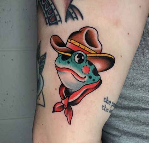 Traditional Tattoos Funny, Traditional Cowboy Hat Tattoo, Thigh Tattoo American Traditional, Cowboy Animal Tattoo, American Traditional Western Tattoo, American Traditional Cowboy, Upper Thigh Tattoo, Western American Traditional Tattoo, Yugioh Tattoo