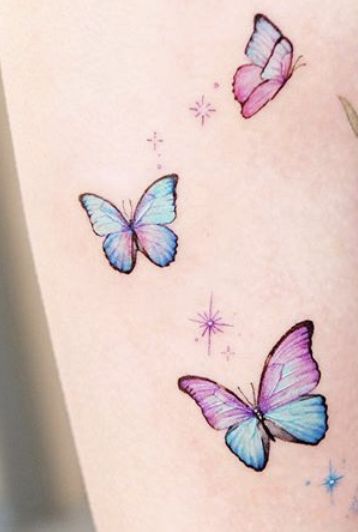 Pink And Blue Butterfly Tattoo, Blue Butterfly Tattoo Wrist, Blue Butterfly Tattoo Collarbone, Blue Rose And Butterfly Tattoo, Blue Watercolor Butterfly Tattoo, Pink And Blue Butterfly, Pink Purple Blue Butterfly Tattoo, Friends Tattoos, Blue Butterfly Tattoo