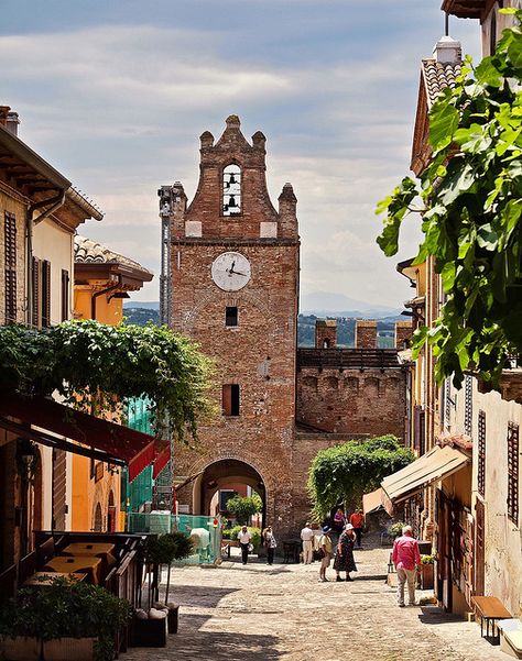 The main street of the medieval walled village of Gradara in Italy by Anguskirk, via Flickr Places In Italy, Regions Of Italy, Visit Italy, Clock Tower, Dream Destinations, Places Around The World, Granada, Vacation Spots, Italy Travel