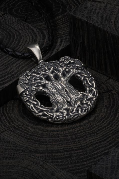 Embrace the essence of Norse mythology with the Yggdrasil Pendant. This striking piece represents the mighty Ash Tree, a revered symbol in Viking lore. Featuring the iconic Hugin Munin, it's a testament to wisdom and memory. Crafted from pure Sterling Silver, this pendant is more than just jewelry – it's a connection to the ancient realms. The sterling silver standard of 92.5% silver and 7.5% copper ensures lasting quality. Norse Necklace, Viking Aesthetic, World Tree, Norse Jewelry, Scandinavian Jewelry, Ash Tree, Viking Pendant, Viking Necklace, Unique Gifts For Him