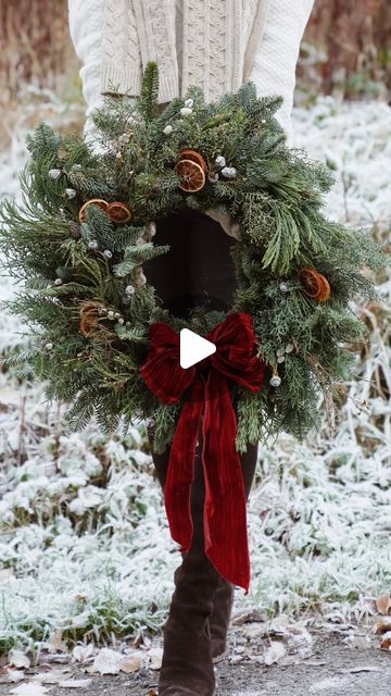 LAUREN MCDERMOTT on Instagram: "Red bows everywhere!!🌲❤️✨   Quite a few people have asked where to buy the big crushed velvet bow on our wreath, and it’s very easy and affordable to make and you can bring it out year after year.   This way of tying a full bow works on all size of ribbons, you just need to swap your fingers for someone’s wrists if you’re using a huge ribbon like the one on our giant wreath 😆   I’ll link that ribbon on stories now.   Cannot wait to collect our real tree and go all out Christmas this weekend 👏🏼 🤩.   Is yours up? 🎄   #ChristmasBow #Bows #BowTutorial #PerfectBow #Wreath #HomemadeWreath #largewreath #christmasdecor #christmasstyle #redbow #howtomakeabow" Wreath With Bows Christmas, How To Tie A Big Bow For A Wreath, Lauren Mcdermott, Giant Christmas Wreath, Giant Wreath, Giants Wreath, Velvet Christmas Bow, Natural Christmas Wreaths, Christmas Wreath Bow