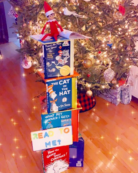 Elf On The Shelf Book Tower, Elf On The Shelf Book, Book Tower, Shelf Book, Grinch Stole Christmas, Holiday Party Decorations, Shelf Ideas, On The Shelf, Frosted Flakes Cereal Box