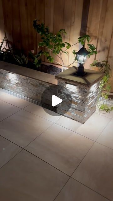 Landscape Legends on Instagram: "Last home posted but now at night time with lights 😍🤩 #landscape #landscapelegends #pavers #artificialgrass #retainingwalls #waterfall #floatingbench #decks #pergolas #porcelain #porcelainpavers #fencing #outdoorlights #landscapinglights #concrete #driveway #outdoor #outdoors #backyard #frontyard #planterboxes #landscaping #hardscape #waterfalls #SOD #irrigation #landscapelighting #tiles #entrepreneur #follow" Retaining Wall With Lights, Paver Walls Ideas, Concrete Fence Posts, Outdoor Dining Room, Fence Lighting, Fence Post, Artificial Grass, Outdoor Planters, Retaining Wall