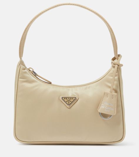 Re-Edition 2000 Re-Nylon Mini shoulder bag in beige - Prada | Mytheresa Prada Bag Re Edition, 2000s Bags, 2000s Prada Bag, Prada Re Edition 2000, Tan Prada Bag, Prada Re Edition 2000 Bag, Prada Re Edition 1995 Bag, Prada Re Edition, Heeled Rain Boots