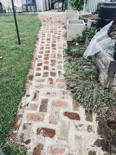 How to make a DIY Cobblestone Path - Cheap! - The Grand Ole Apiary Brick Next To Sidewalk, Brick Walk Ways Pathways, Diy Sidewalks Walkways, Cheap Diy Patio Flooring, Diy Front Walkway Cheap, Diy Sidewalk Ideas Cheap, Easy Diy Walkway, Front Porch Pathway Walkway Ideas, Brick Driveway Diy