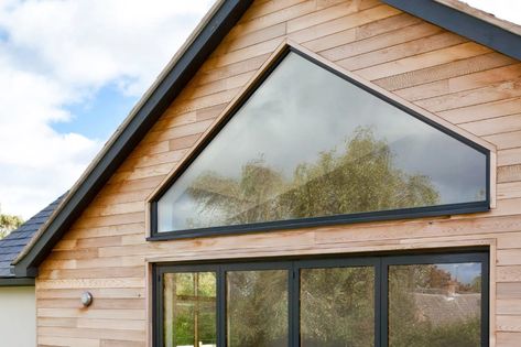 Raked windows from Idealcombi UK - sloping, angled & triangle windows Triangle Windows, Triangle Window, Loft Windows, Gable Window, Triangle House, 70s House, Shaped Windows, Self Build, Nantucket Style