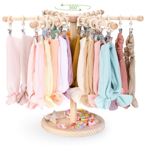 PRICES MAY VARY. Essential Newborn Storage (Excluding Headbands And Bows) The POVETIRE hair accessories organizer (patent pending) is versatile enough to hold all baby items: headbands, hair bows, hair ties, bibs, burp wipes, pacifier clips, baby hats, bracelets, glasses, and other baby essentials! Easy Rotation Function : Rotate freely to the hanger with hair accessories you want to pick up, we use the best link rotation process, rotating the chassis does not move. The headband organizer rack i Storage For Bows And Headbands, Baby Shoe Organizer, Bow Organizer Nursery, Baby Bow Storage, Headband Storage Ideas, Baby Bow Organization, Bow Storage Ideas, Headband Organization, Baby Headband Holder