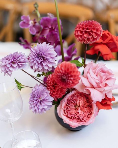 Tegan O'Brien : Floral Design and Styling on Instagram: "Purple, red and pink. A match made in heaven. ⁠ Photographer: @saltatelier_wedding Venue: @thecentennialhomestead ⁠ ⁠ ⁠ ⁠ ⁠ ⁠ ⁠ ⁠ ⁠ ⁠ ⁠ #thelillipillian #hellomay #centennialhomestead #centennialhomesteadweddings #sydneyflowers #sydneyflorist #sydneyweddingflowers #australianflowers #tableflowers #tablearrangements #weddingtable #weddingdetails #floralstyling #floralstylist #weddingstyle #sydneyweddingstylist #flowerarragement #wedd Red Pink Purple Blue Wedding, Red Orange Purple Pink Wedding, Lilac And Red Wedding, Purple And Red Wedding, Red Purple Wedding, Purple Flower Centerpieces, Red And Purple Wedding, Planner Images, Purple Wedding Tables