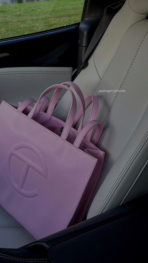 Pink bubblegum telfar bag on car seat, passenger princess Telfer Bag Pink, Pink Telfar Bag Aesthetic, Telfar Pink Bag, Pink Telfar Outfit, Bubblegum Telfar Bag, Pink Telfar Bag Outfit, Telfar Bag Pink, Telfar Bags Medium, Pink Telfar Bag