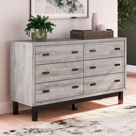 Dresser Description Craft a contemporary hideaway without breaking the bank. An elegant juxtaposition of refined neutral hues, this two-toned dresser brings sleek style to your space. Matte black drawer handles enhance the sheer simplicity of its profile. With this storage piece, a bedroom brimming with luxury has never been more attainable. Dresser Features Dresser onlyMade with engineered wood (MDF/particleboard/plywood) and decorative laminate for the right balance of affordability and durabi Low Profile Bedroom, Two Tone Dresser, Black Drawer Handles, Sleigh Bedroom Set, Black Drawer, Platform Bedroom Sets, Panel Bedroom, Upholstered Bedroom, Casual Dining Rooms