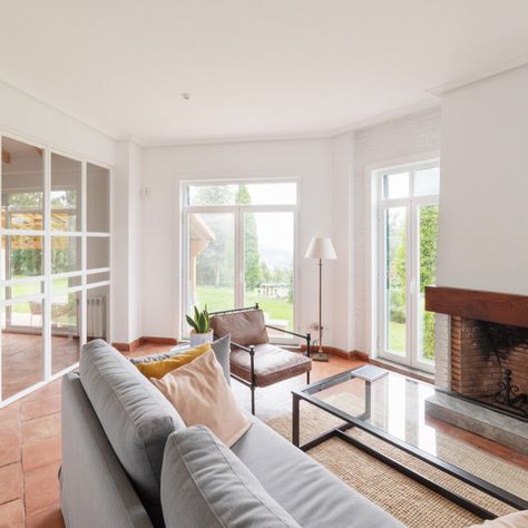 75 Beautiful Living Room with Terra-cotta Floors Ideas & Designs - June 2024 | Houzz AU Terracota Floors, Sofa Terracota, Light Gray Sofa, Terra Cotta Floors, Sunroom Fireplace, Terracotta Living Room, Floors Ideas, Light Gray Sofas, Carport Garage