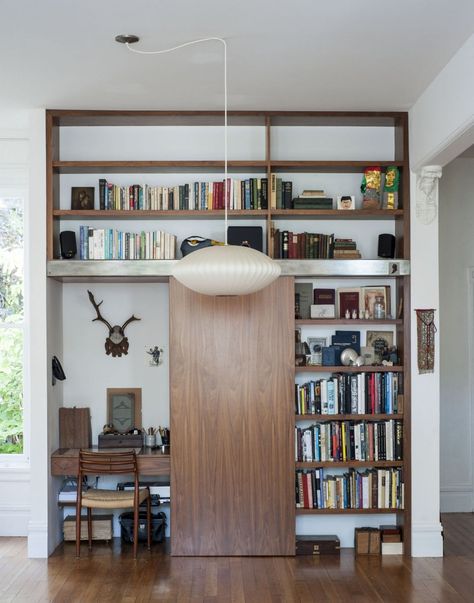 The Disappearing Home Office of Dagmar Daley and Zak Conway in San Francisco Sliding Bookshelf, Smart Home Dashboard, Hidden Desk, Disc Interiors, Small Space Office, Desk Areas, Small Space Solutions, Work Spaces, Contemporary Aesthetic