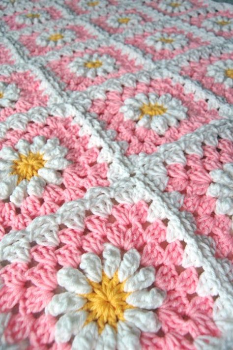 Pink Daisy Granny Square Crochet Blanket by tillie tulipYou can... Motifs Afghans, Baby Poncho, Crocheted Blanket, Crochet Granny Square Blanket, Crochet Daisy, Manta Crochet, Crochet Afghans, Granny Squares Pattern, Crochet Motifs