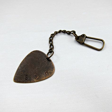 DIY Gift Idea: Stamped Metal Guitar Pick | Morena's Corner Guitar Pick Diy Crafts, How To Make Guitar Picks, Cute Diy Keychains, Diy Guitar Pick, Easy Cute Diy, Homemade Guitar Picks, How To Make A Guitar Pick Necklace, Keychains Ideas, Keychain Music