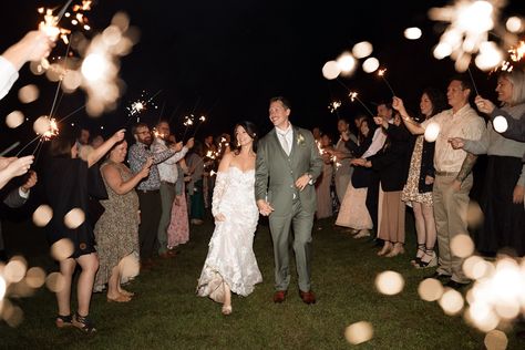 The sparkler exit: the perfect blend of romance and celebration. We lit up the night sky moments before the dance floor opened, a magical feeling we will never forget. Photographers: @shaeandevan Venue: @whispering_springs . 🏷️ #summerwedding #augustwedding #summer #wedding #weddingday #weddingdress #weddingphotography #weddinginspiration #sparkjoy #gardenparty #weddingideas #weddingdecor #skyfullofstars #sparkle #sparklersendoff #sparklersurprise #kiss #ido #brideandgroomphotos #brideand... Sparkler Send Off, Sparkler Exit, August Wedding, Sky Full Of Stars, We Will Never Forget, Bride And Groom Photos, The Night Sky, The Dance, Dance Floor